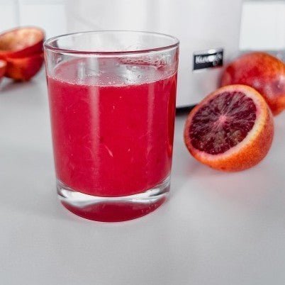 Blutorangensaft mit Zitruspresse